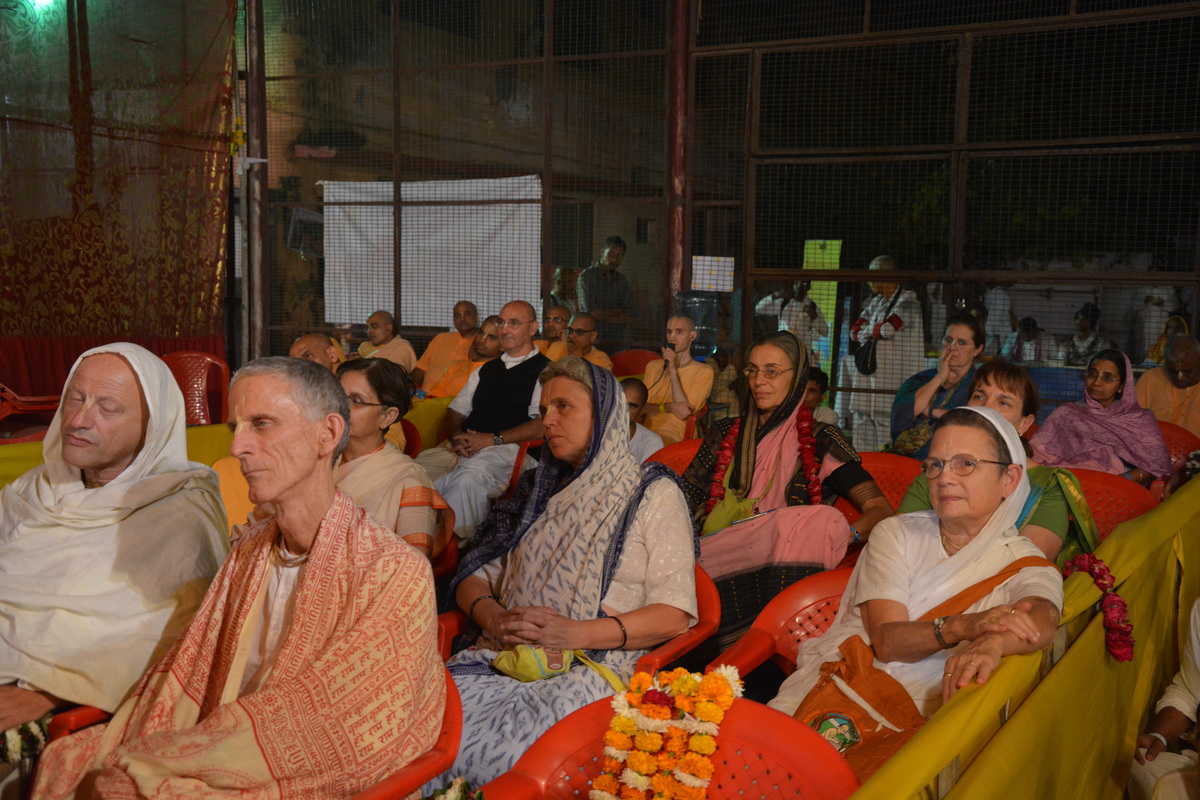 Senior Devotees listening to Radhanath Swami