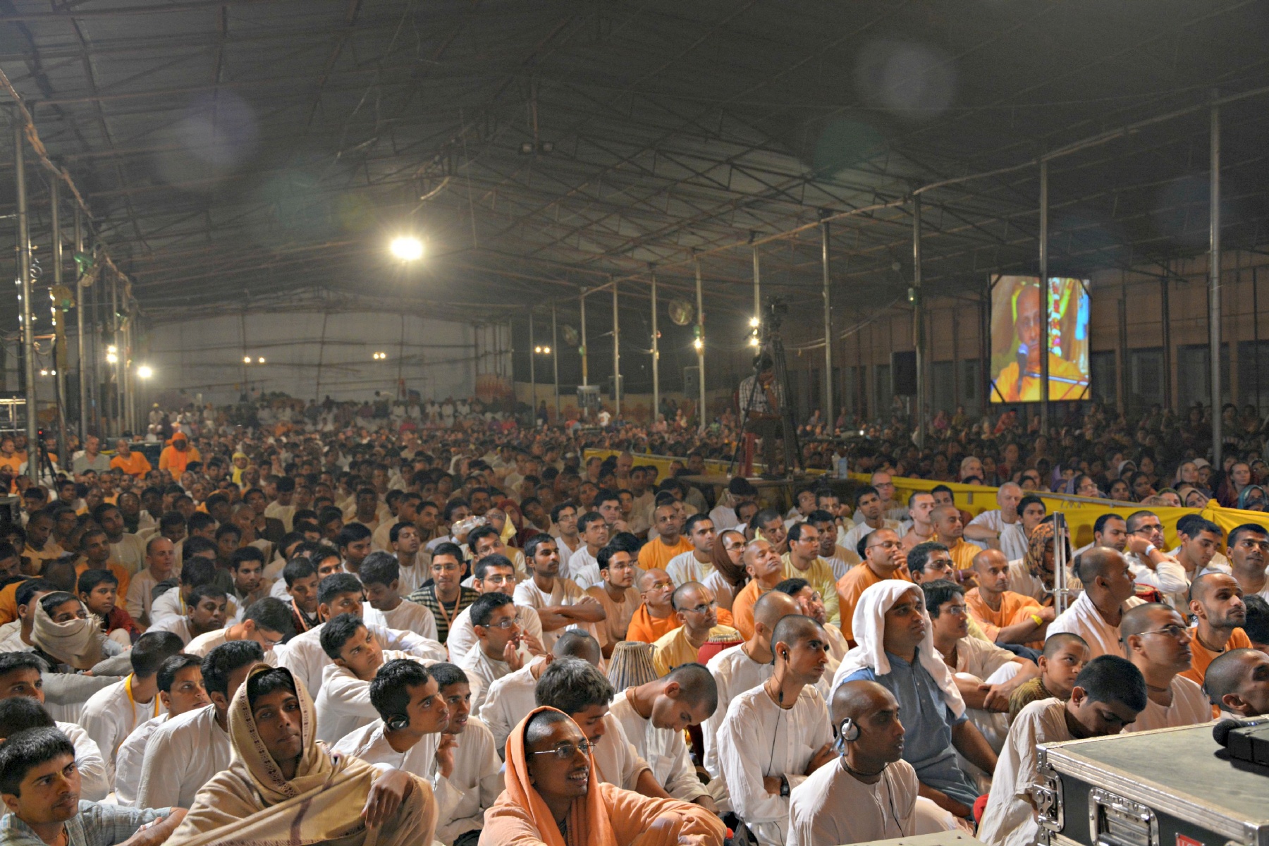 Devotees listening to lecture
