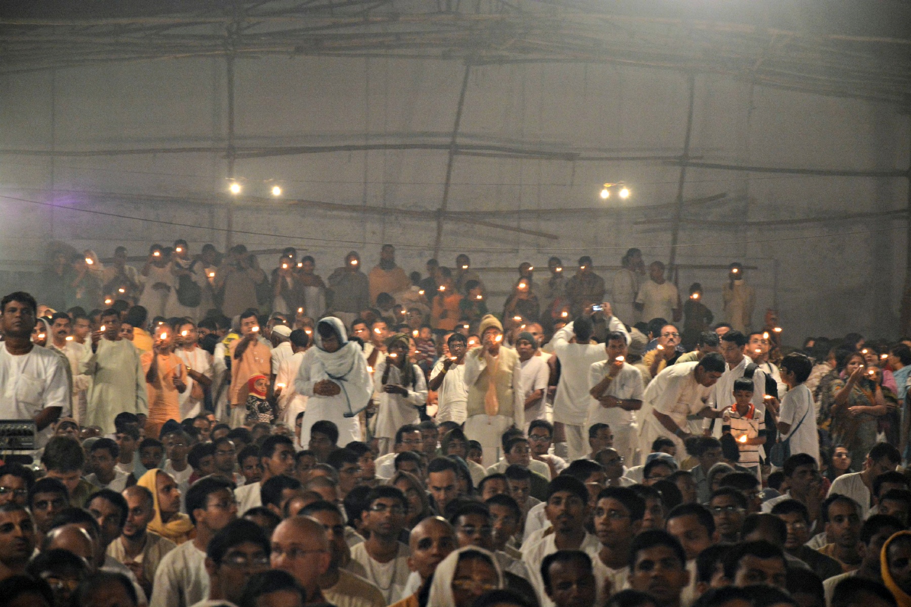 Devotees offering lamp
